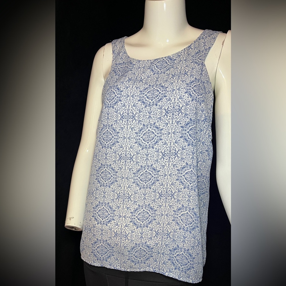 Paper Crane high neck tank, small-medium, pale blue and white geometric floral.
